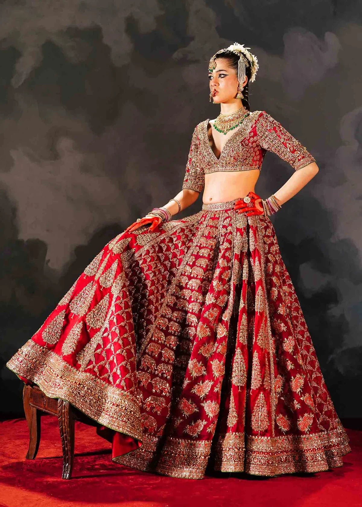 Hussain Rehar Raaqs red pure organza lehenga choli featuring intricate hand embellishments with rich dimensional finish, paired with a pure organza scallop cutwork dupatta that drapes gracefully with ethereal lightweight movement, perfect for bridal wear, weddings, receptions, and grand celebrations.