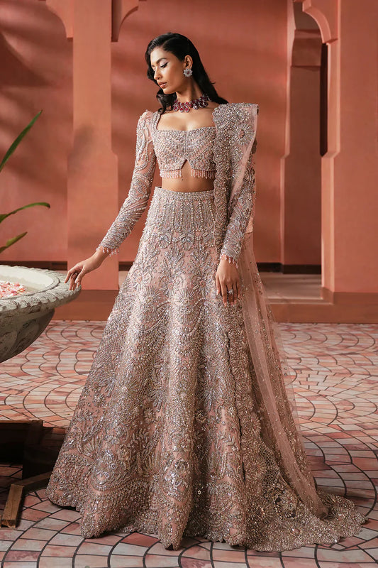 Soraya Catherine soft pink net bridal lehenga choli featuring intricate handwork with sparkling crystals, classic dabka embroidery, fine katdana detailing, and traditional mukesh work on a delicately embellished lehenga, paired with a matching net dupatta with coordinated detailing, perfect for wedding ceremonies, nikkah, and bridal receptions.