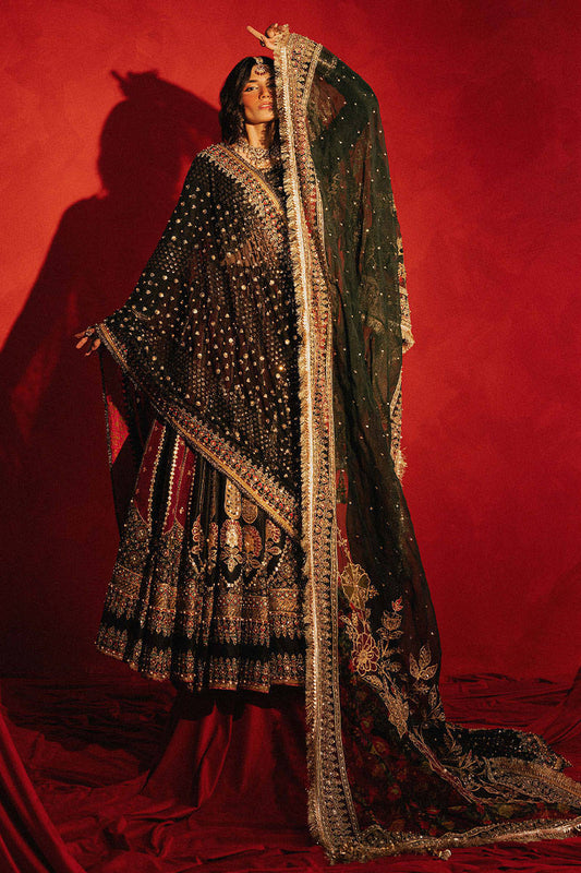 Mohsin Naveed Ranjha Dil Raas black Indian silk lehenga choli featuring a full-sleeved choli with metallic and silk thread embroidery in star-like patterns, paired with a lehenga in deep maroon fading to black with embroidered cypress trees, palmette motifs, mirrorwork, sequins, and golden thread detailing, finished with maroon and gold layered borders, complete with a lightweight organza dupatta featuring maroon and gold floral sprays, gota pati, and adda work, perfect for bridal wear and formal celebratio