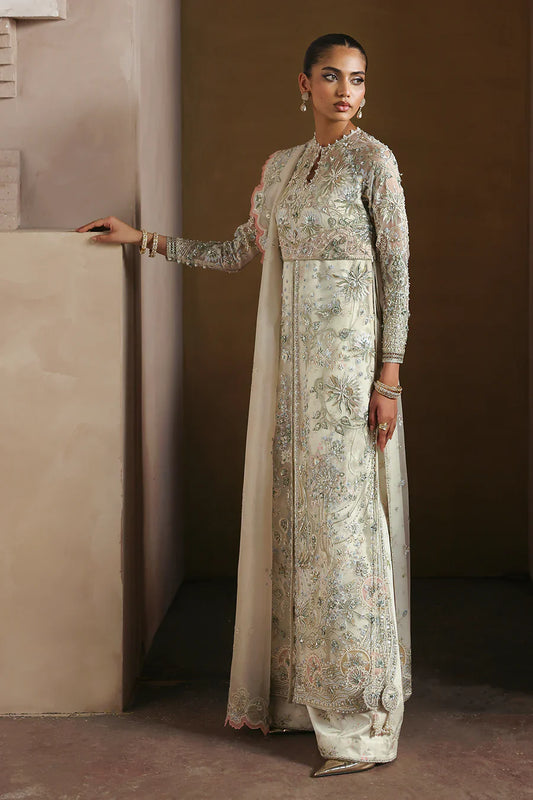 Soraya Novara ivory and gold formal ensemble featuring a beautifully embellished shirt with intricate handwork blending delicate thread embroidery, shimmering sequins, and fine embellishments on a soft ivory base with detailed gold accents, paired with a complementing dupatta, perfect for weddings, receptions, engagement ceremonies, and festive celebrations.
