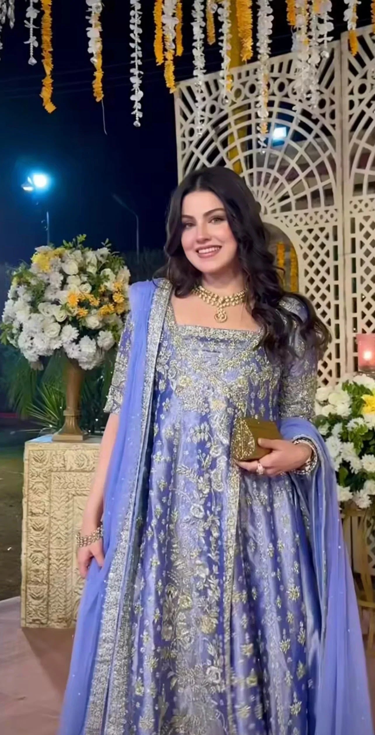 Haris Shakeel inspired Eyena ensemble in soft periwinkle-lilac featuring intricate silver zari, sequins, and resham embroidery delicately scattered across flowing panels with a richly embellished border, paired with a sheer net dupatta, perfect for festive occasions, mehndi functions, nikkah ceremonies, and formal gatherings.