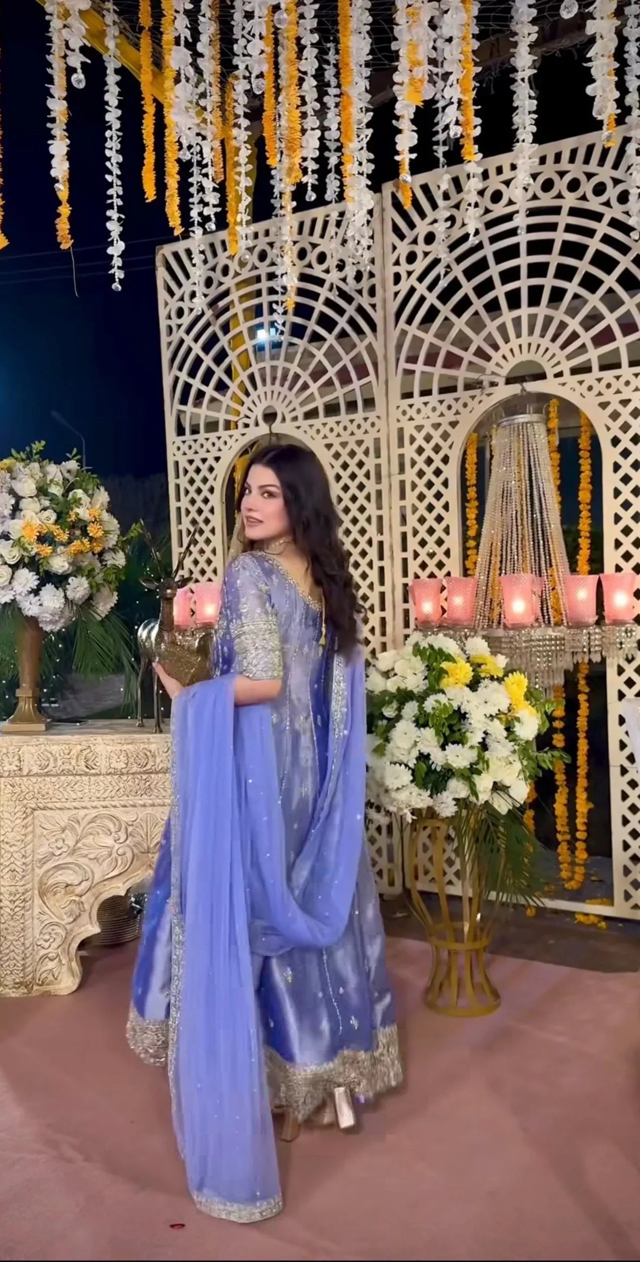 Haris Shakeel inspired Eyena ensemble in soft periwinkle-lilac featuring intricate silver zari, sequins, and resham embroidery delicately scattered across flowing panels with a richly embellished border, paired with a sheer net dupatta, perfect for festive occasions, mehndi functions, nikkah ceremonies, and formal gatherings.