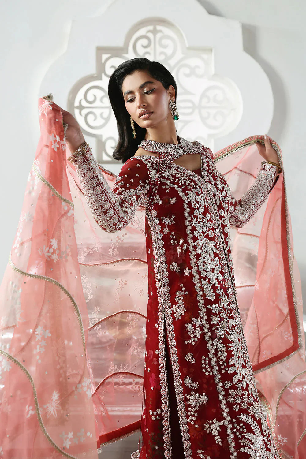 Soraya Solara Pakistani designer festive luxury ensemble with a soft luminous aesthetic and beautifully curated detailing, featuring a refined balance of texture and harmony, creating an effortlessly graceful couture look for modern festive occasions.