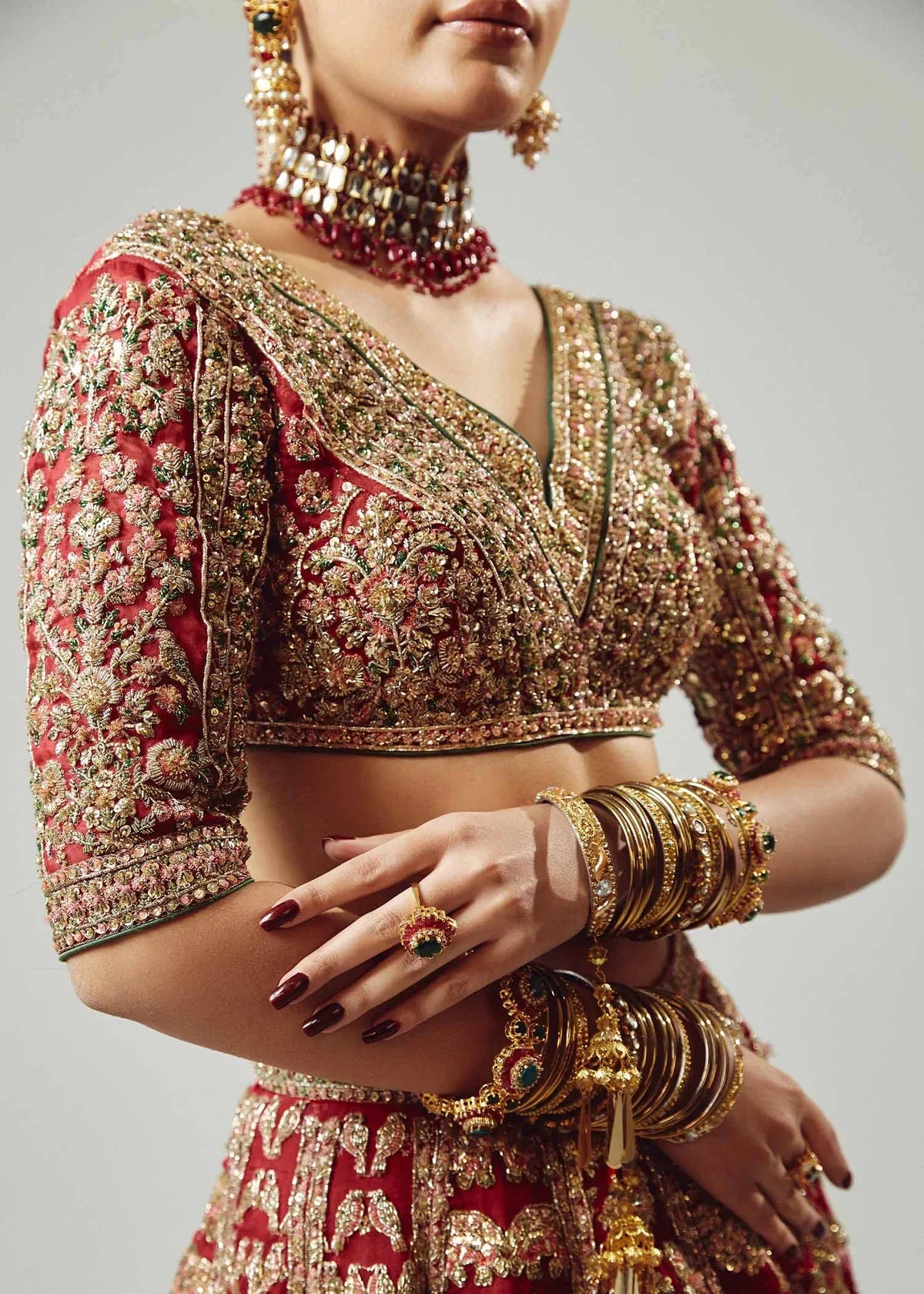 Hussain Rehar Raaqs red pure organza lehenga choli featuring intricate hand embellishments with rich dimensional finish, paired with a pure organza scallop cutwork dupatta that drapes gracefully with ethereal lightweight movement, perfect for bridal wear, weddings, receptions, and grand celebrations.