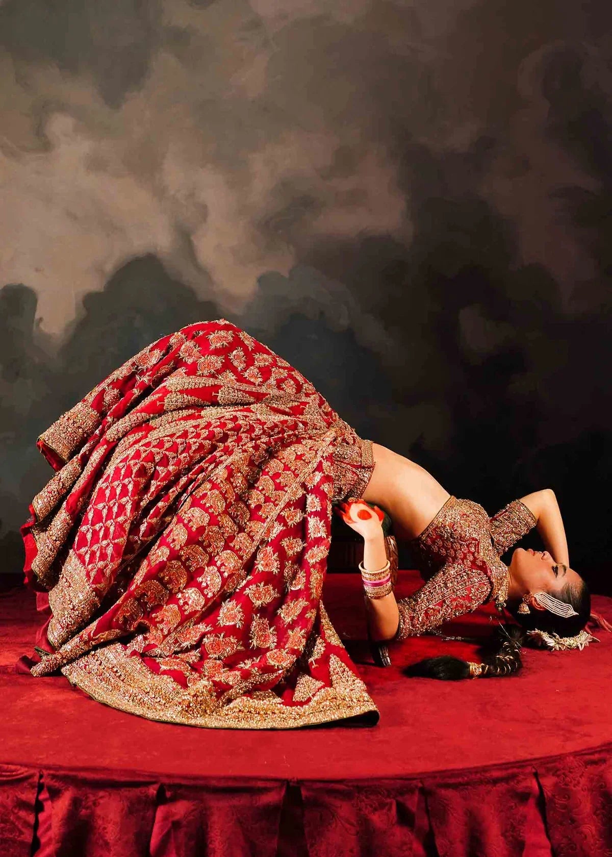Hussain Rehar Raaqs red pure organza lehenga choli featuring intricate hand embellishments with rich dimensional finish, paired with a pure organza scallop cutwork dupatta that drapes gracefully with ethereal lightweight movement, perfect for bridal wear, weddings, receptions, and grand celebrations.