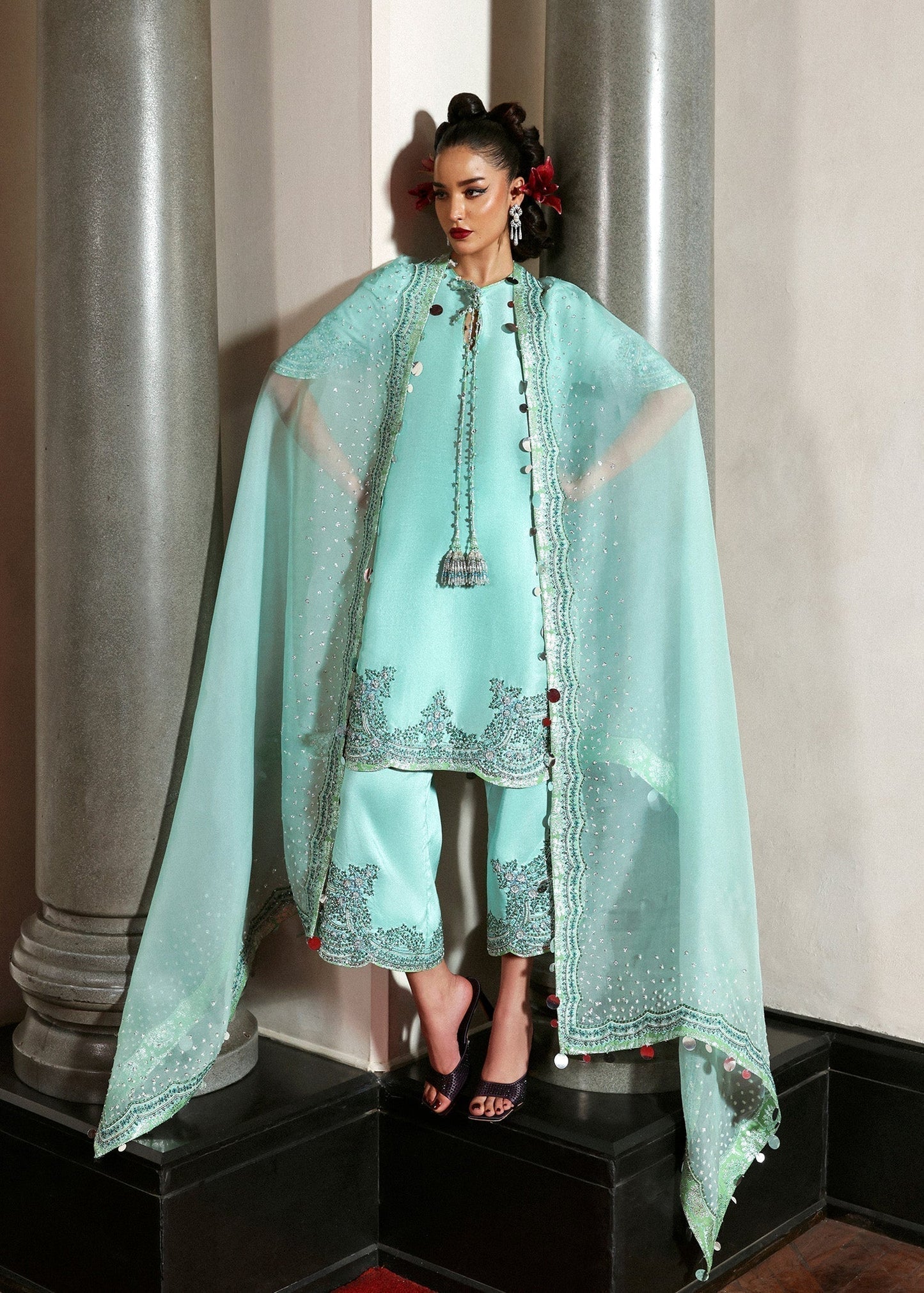 Hussain Rehar Mynt ensemble crafted from luxurious fabric featuring delicate embellishments with refined tailoring and graceful flow in soothing tones, paired with an accompanying dupatta, perfect for formal occasions and elegant celebrations.