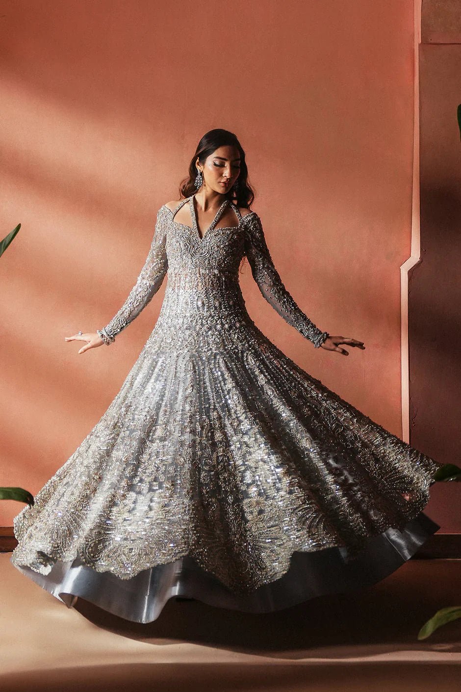 Soraya Anne Pakistani designer luxury formal ensemble featuring meticulous hand embroidery and shimmering embellishments with a regal silhouette, crafted for modern brides and evening occasions, ideal for weddings, receptions, and formal events.