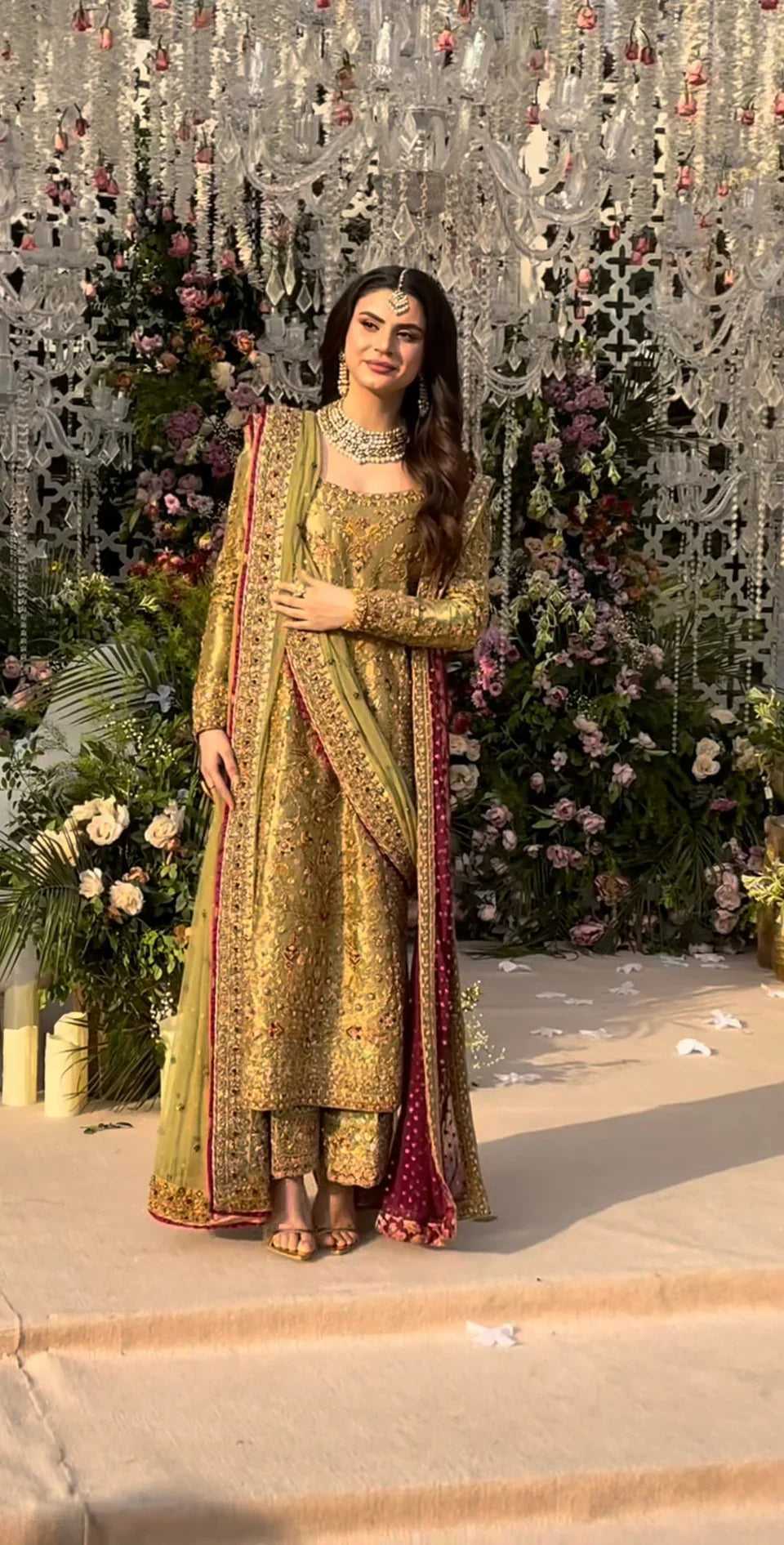 Haris Shakeel inspired pistachio green festive ensemble featuring a shirt with intricate embroidery and delicate embellishments creating a refined luminous texture, paired with a coordinated dupatta with rich contrasting borders and straight-cut trousers, perfect for wedding festivities, formal gatherings, and celebratory occasions.