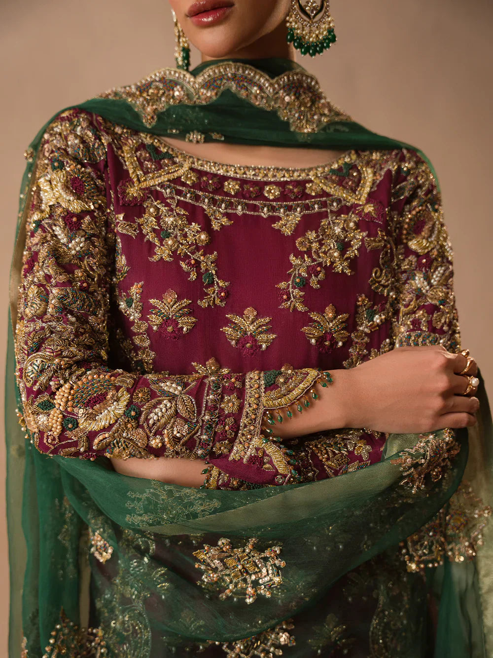Abeera Usman Burgundy Dusk rich burgundy formal ensemble featuring meticulous detailing and delicate embellishments with a fluid silhouette that blends traditional craftsmanship with modern elegance, perfect for weddings, receptions, festive gatherings, and evening events.