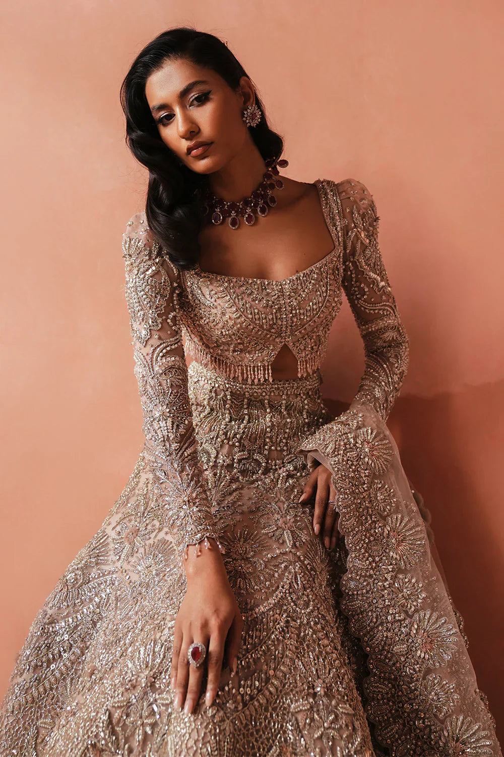 Soraya Catherine soft pink net bridal lehenga choli featuring intricate handwork with sparkling crystals, classic dabka embroidery, fine katdana detailing, and traditional mukesh work on a delicately embellished lehenga, paired with a matching net dupatta with coordinated detailing, perfect for wedding ceremonies, nikkah, and bridal receptions.