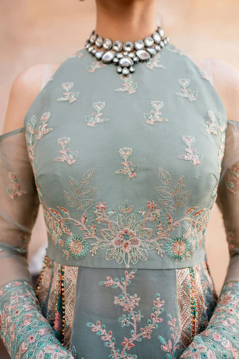 Gossamer Pakistani designer unstitched formal ensemble featuring intricate organza embroidery with components including embroidered blouse pieces, panels, borders, and dupatta, designed to be tailored into a lehnga or other silhouette, perfect for weddings and festive occasions.