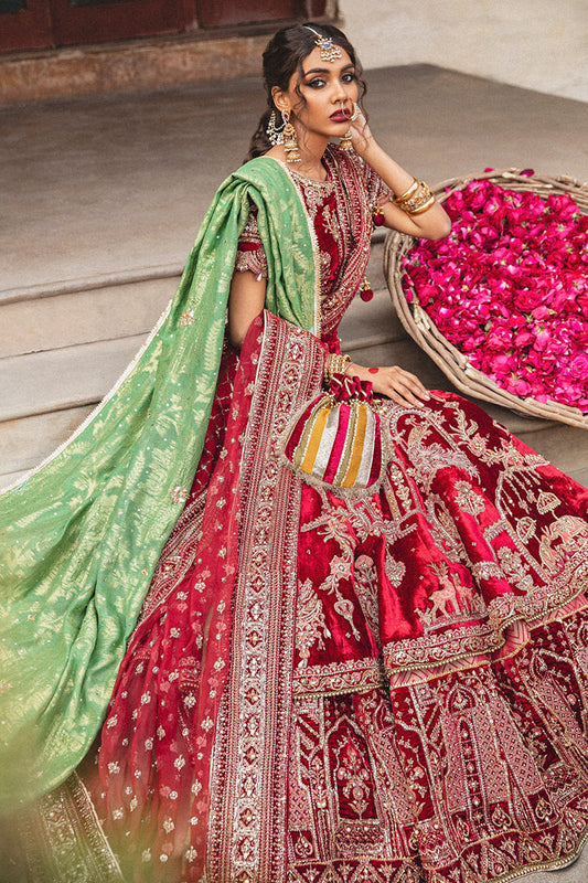 Mohsin Naveed Ranjha MNR HR-71 sindoori red raw silk bridal ensemble featuring a half-sleeved boat neck choli with hand-embellished motifs, worn with a two-tiered lehnga doused in signature Mughal miniature patterns, complete with a chan booti dupatta and a hand-loomed cotton net jamawar shawl, Pakistani luxury wedding formal wear.