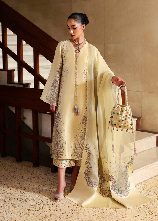 Hussain Rehar Ciel ensemble featuring a refined silhouette with subtle intricate embellishments and luxurious fabric in a graceful drape, paired with a delicately finished dupatta, perfect for formal occasions and elegant celebrations.