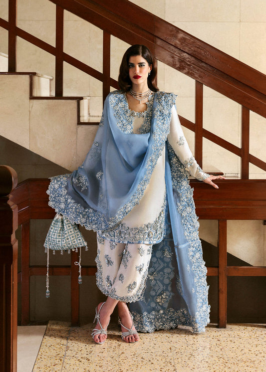 Ivory luxury nikkah dress Virelle Pakistan
White formal dress embroidered organza dupatta
Front view ivory designer dress Pakistan
Close embroidery detail ivory dress
Elegant nikkah outfit Pakistan luxury wear
