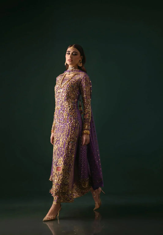 Nomi Ansari Amara Luxe rich purple formal ensemble featuring heavy hand embellishments with a harmonious blend of floral and animal-inspired patterns, bejeweled detailing, fine bordered ezaar work, and a long flowing dupatta with intricate cutwork, perfect for weddings, receptions, and festive celebrations.