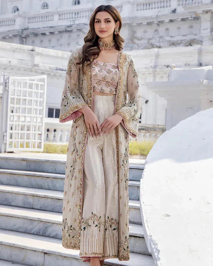 Shazia Kiyani Shanoo unstitched three-piece ensemble in premium organza featuring intricate embroidery, offering timeless elegance and versatility for customization, perfect for weddings, celebrations, and formal gatherings.